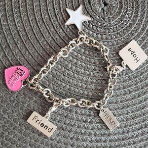 Breast cancer support Redden 5th Avenue stainless steel charm bracelet.